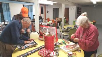 Legion “elves” wrapped the gifts that were donated by post members. (Photo courtesy of Jeff Sukeforth)