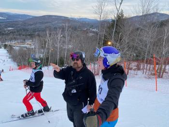 Camden Hills skier J.J. Harrington (202), coach Barry King and skier Devon Smith (150). (Courtesy Mike Smith)
