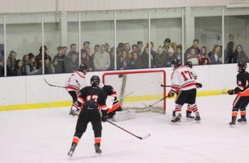 The Camden Hills varsity ice hockey team in its Jan. 4 game against Brunswick. (Courtesy Molly Cole)