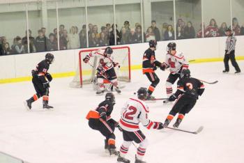 The Camden Hills varsity ice hockey team in its Jan. 4 game against Brunswick. (Courtesy Molly Cole)