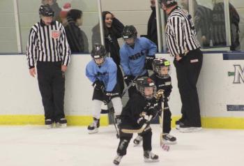 6U skaters participate in a skating session during a break of the Camden Hills varsity ice hockey game Jan. 4.