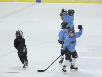6U skaters participate in a skating session during a break of the Camden Hills varsity ice hockey game Jan. 4.