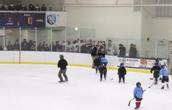 6U skaters participate in a skating session during a break of the Camden Hills varsity ice hockey game Jan. 4.