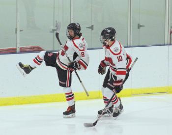 The Camden Hills varsity ice hockey team in its Jan. 4 game against Brunswick. (Courtesy Molly Cole)