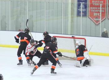 The Camden Hills varsity ice hockey team in its Jan. 4 game against Brunswick. (Courtesy Molly Cole)
