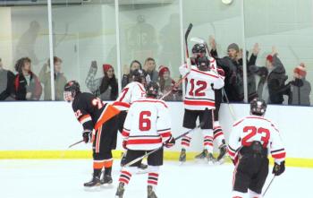 The Camden Hills varsity ice hockey team in its Jan. 4 game against Brunswick. (Courtesy Molly Cole)