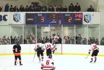 The Camden Hills varsity ice hockey team in its Jan. 4 game against Brunswick. (Courtesy Molly Cole)