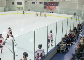 The Camden Hills ice hockey team in a Jan. 11 game. (Courtesy Molly Cole)