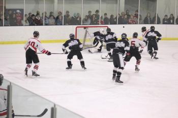 The Camden Hills ice hockey team in a Jan. 11 game. (Courtesy Molly Cole)