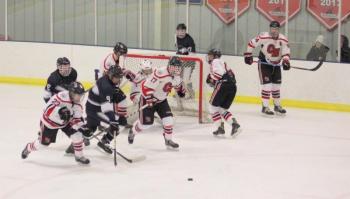 The Camden Hills ice hockey team in a Jan. 11 game. (Courtesy Molly Cole)