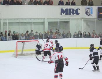 The Camden Hills ice hockey team in a Jan. 11 game. (Courtesy Molly Cole)