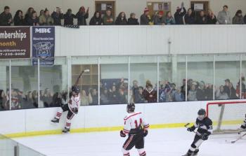 The Camden Hills ice hockey team in a Jan. 11 game. (Courtesy Molly Cole)