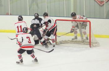 The Camden Hills ice hockey team in a Jan. 11 game. (Courtesy Molly Cole)