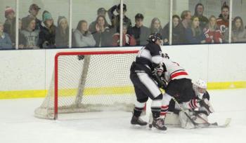 The Camden Hills ice hockey team in a Jan. 11 game. (Courtesy Molly Cole)