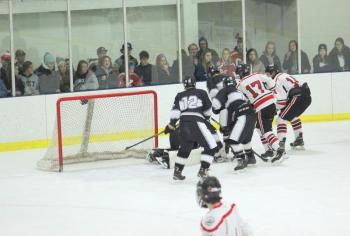 The Camden Hills ice hockey team in a Jan. 11 game. (Courtesy Molly Cole)