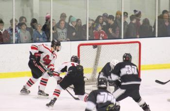 The Camden Hills ice hockey team in a Jan. 11 game. (Courtesy Molly Cole)