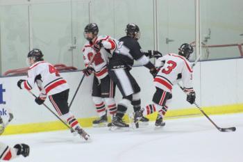 The Camden Hills ice hockey team in a Jan. 11 game. (Courtesy Molly Cole)