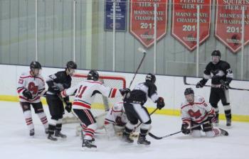 The Camden Hills ice hockey team in a Jan. 11 game. (Courtesy Molly Cole)