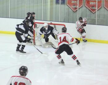 The Camden Hills ice hockey team in a Jan. 11 game. (Courtesy Molly Cole)
