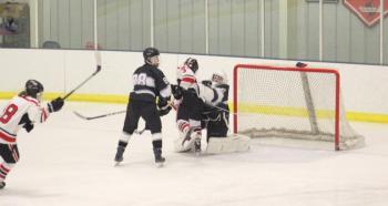 The Camden Hills ice hockey team in a Jan. 11 game. (Courtesy Molly Cole)