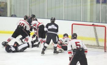 The Camden Hills ice hockey team in a Jan. 11 game. (Courtesy Molly Cole)
