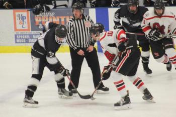The Camden Hills ice hockey team in a Jan. 11 game. (Courtesy Molly Cole)