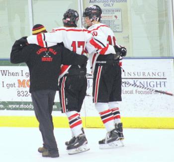 The Camden Hills ice hockey team in a Jan. 11 game. (Courtesy Molly Cole)