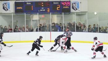 The Camden Hills ice hockey team in a Jan. 11 game. (Courtesy Molly Cole)