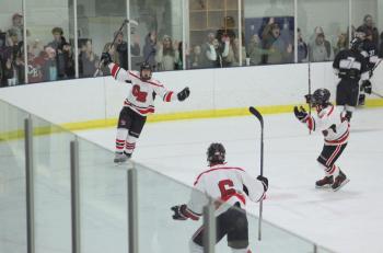 The Camden Hills ice hockey team in a Jan. 11 game. (Courtesy Molly Cole)