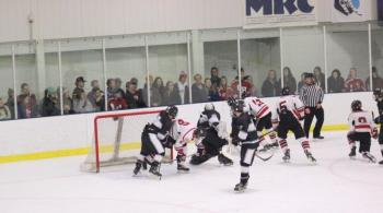 The Camden Hills ice hockey team in a Jan. 11 game. (Courtesy Molly Cole)