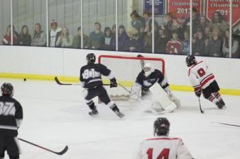The Camden Hills ice hockey team in a Jan. 11 game. (Courtesy Molly Cole)