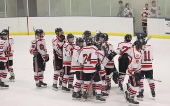 The Camden Hills ice hockey team in a Jan. 11 game. (Courtesy Molly Cole)