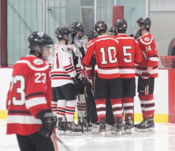The Camden Hills varsity ice hockey team in a Jan. 14 game. (Courtesy Molly Cole)