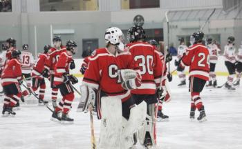 The Camden Hills varsity ice hockey team in a Jan. 14 game. (Courtesy Molly Cole)