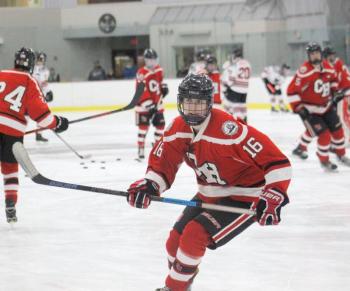 The Camden Hills varsity ice hockey team in a Jan. 14 game. (Courtesy Molly Cole)