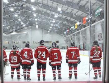 The Camden Hills varsity ice hockey team in a Jan. 14 game. (Courtesy Molly Cole)