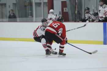 The Camden Hills varsity ice hockey team in a Jan. 14 game. (Courtesy Molly Cole)