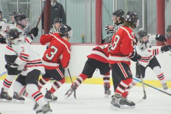 The Camden Hills varsity ice hockey team in a Jan. 14 game. (Courtesy Molly Cole)
