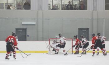 The Camden Hills varsity ice hockey team in a Jan. 14 game. (Courtesy Molly Cole)