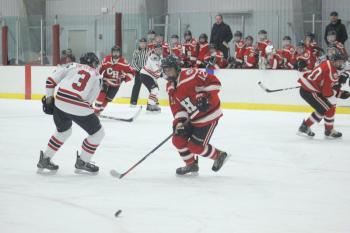 The Camden Hills varsity ice hockey team in a Jan. 14 game. (Courtesy Molly Cole)