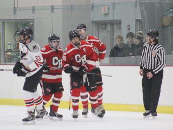 The Camden Hills varsity ice hockey team in a Jan. 14 game. (Courtesy Molly Cole)