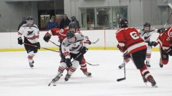 The Camden Hills varsity ice hockey team in a Jan. 14 game. (Courtesy Molly Cole)