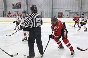 The Camden Hills varsity ice hockey team in a Jan. 14 game. (Courtesy Molly Cole)