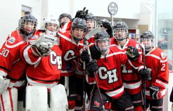 The Camden Hills varsity ice hockey team in a Jan. 14 game. (Courtesy Molly Cole)