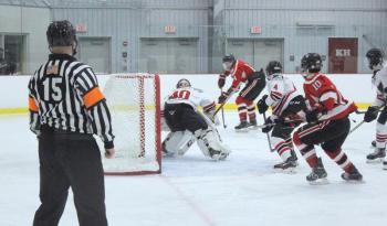 The Camden Hills varsity ice hockey team in a Jan. 14 game. (Courtesy Molly Cole)