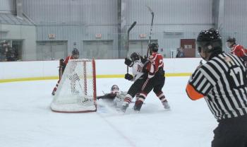 The Camden Hills varsity ice hockey team in a Jan. 14 game. (Courtesy Molly Cole)