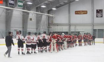 The Camden Hills varsity ice hockey team in a Jan. 14 game. (Courtesy Molly Cole)