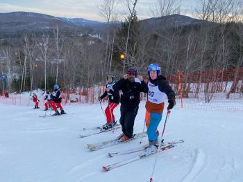 Camden Hills coach Barry King and skier Devon Smith (150). (Courtesy Mike Smith)
