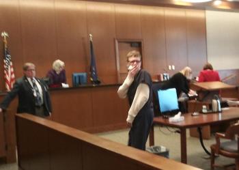 Sharon Kennedy (formerly Carrillo) looks back at her family as she is escorted out of the courtroom. (photo by Erica Thoms)