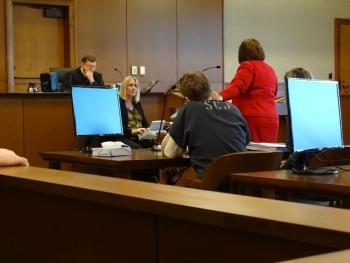 AAG Zainea speaks to Justice Robert Murray. (photo by Erica Thoms)